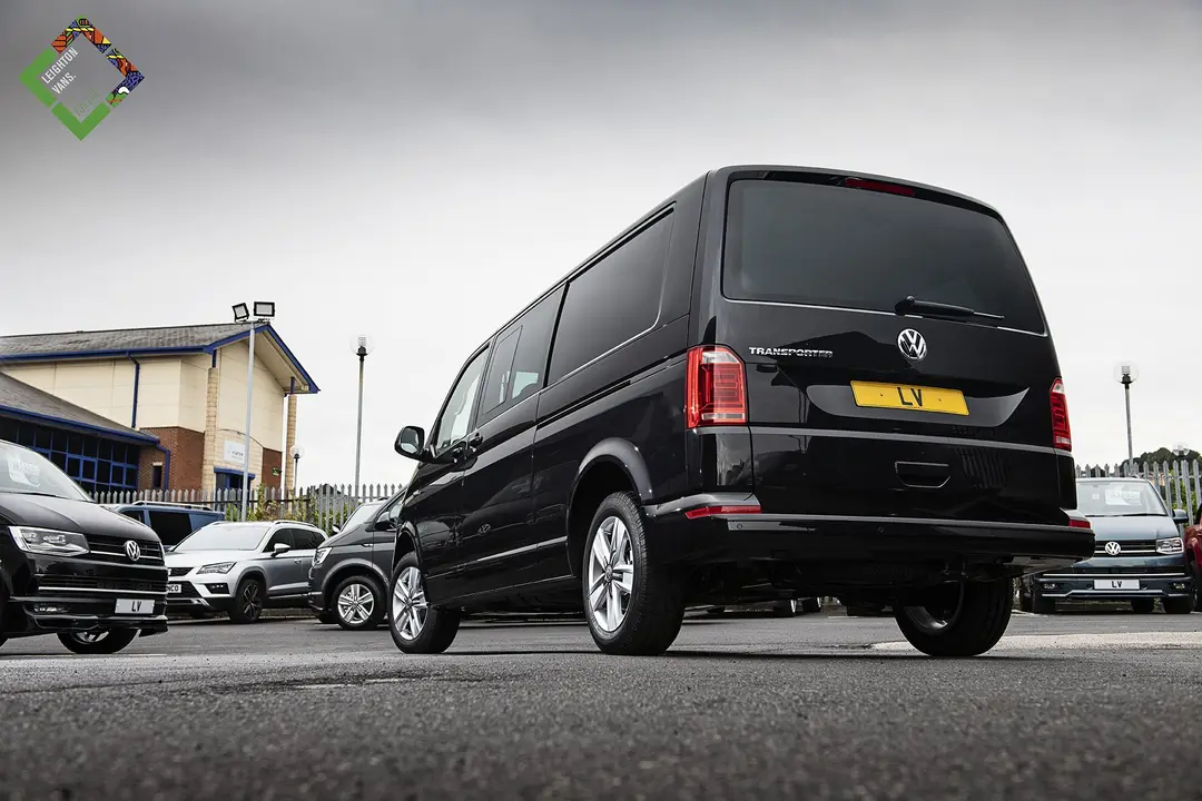 Black VW Transporter kombi from the rear